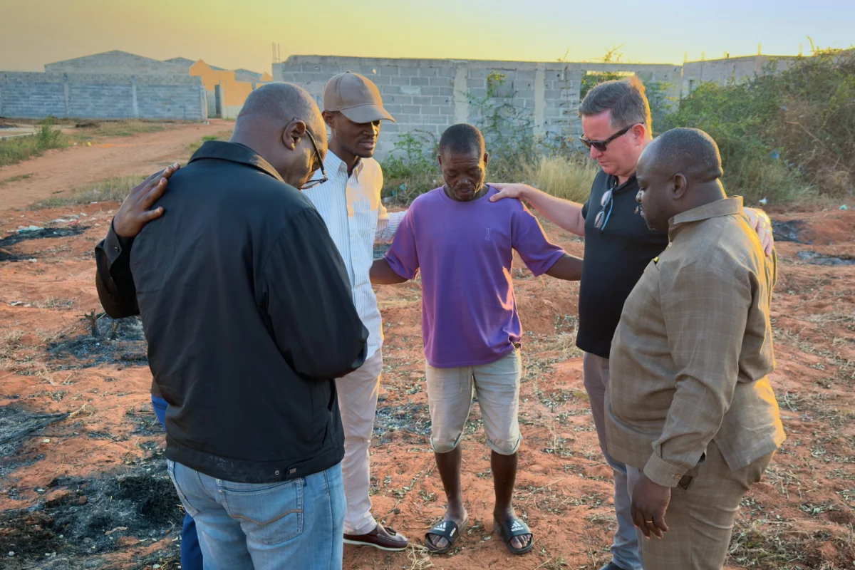 chris-men-praying-africa-2026